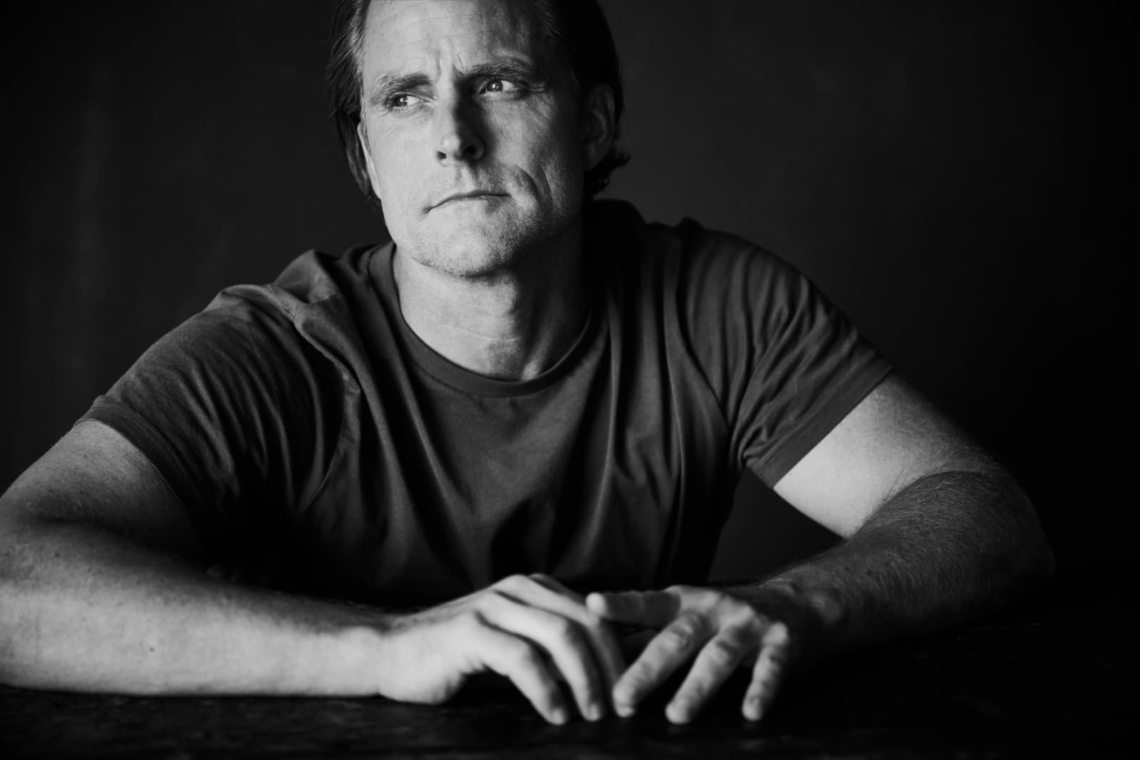 Jason Milne, black-and-white contemplative portrait